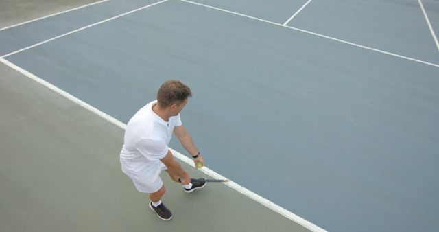 Tennis Player Positioned Ready For Serve On Court - Download Free Stock Images Pikwizard.com