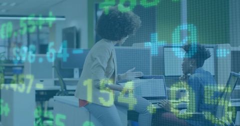 Office workers discussing financial metrics with data overlay