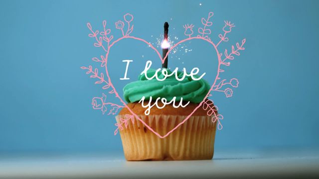 Video shows a decorated cupcake with green icing and a lit sparkler. Around the cupcake is a hand-drawn pink heart with the text 'I love you'. This is perfect for use in romantic greeting cards, Valentine's Day promotions, birthday invitations, and love-themed campaigns.