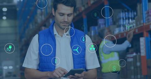 Warehouse worker scanning with handheld tablet, digital overlays showing logistics data