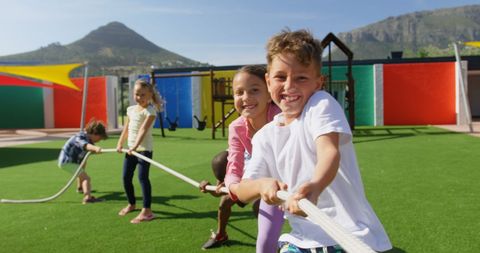 Children Playing Tug of War Outdoors in Schoolyard - Download Free Stock Images Pikwizard.com