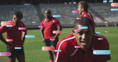 Soccer players training with augmented reality performance tags and analytics on stadium field