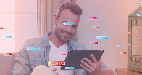 Man Viewing Floating Analytics on Tablet at Home