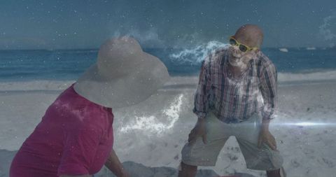 Laughing senior couple leaning on sandy beach with galaxy nebula overlay and sunglasses