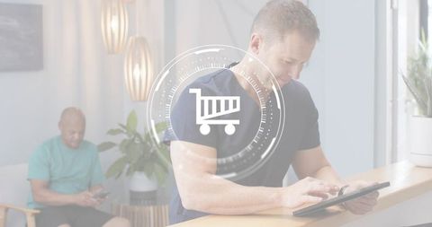 Fit man tapping tablet at reception interacting with virtual shopping cart interface