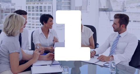 Business Professionals Engaging in Productive Meeting in Modern Office