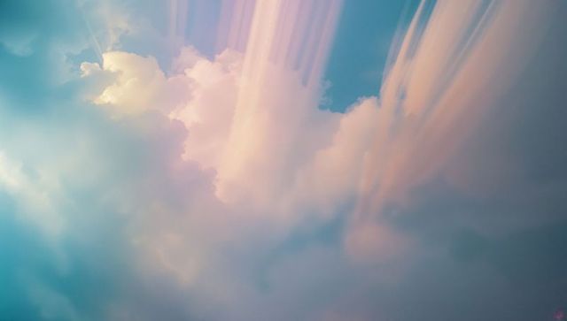 Ethereal Pastel Clouds with Dreamy Light Beams Streaming Down
