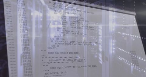 Running SQL Code Overlaying Server Rack with LED Reflections and Monochrome Bokeh