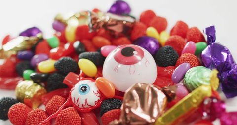 Colorful Halloween Candy Assortment with Decorative Eyeballs