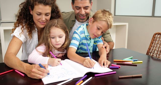 Smiling Family Drawing Together at Table - Download Free Stock Images Pikwizard.com