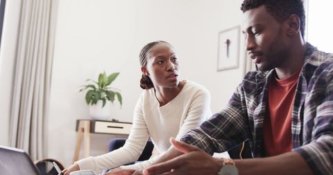 Couple Reviewing Finances Together in Living Room - Download Free Stock Images Pikwizard.com