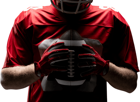 Intense moments: american football player holding ball transparent background