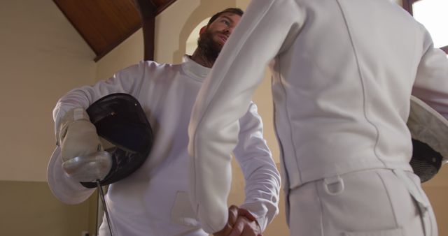 Fencing Athletes Shaking Hands After Training in Gym - Download Free Stock Images Pikwizard.com