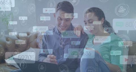 Couple Engaging with Technology in Cozy Home Setting