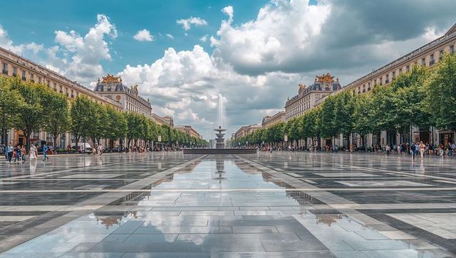 Framing central fountain mirroring on shiny plaza with tree-lined avenues and ornate facades