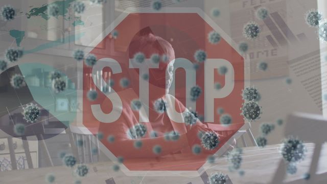 Conceptual video showing disheartened woman using smartphone at home with overlays of a stop sign and virus cells, conveying themes of pandemic prevention, personal safety, and the emotional impact of COVID-19. Suitable for use in educational materials, healthcare campaigns, and mental health awareness content.