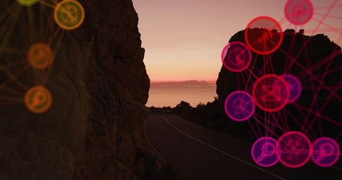 Networking concepts among rocky coastal landscape at sunset