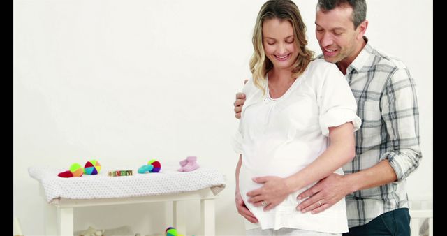 Expectant Couple Embracing Belly, Preparing for Parenthood - Download Free Stock Images Pikwizard.com