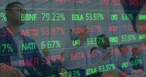 Businesspeople Focused on Real-Time Stock Exchange Figures - Download Free Stock Images Pikwizard.com