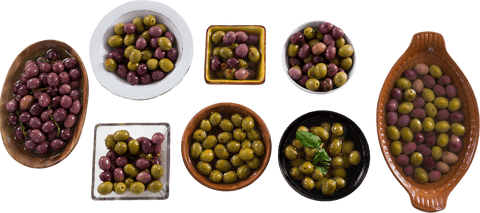 Transparent background with varied olive bowls displays rustic charm