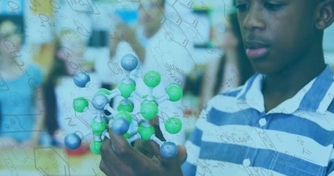 Child Learning Science Holding Molecular Model Educational Concept