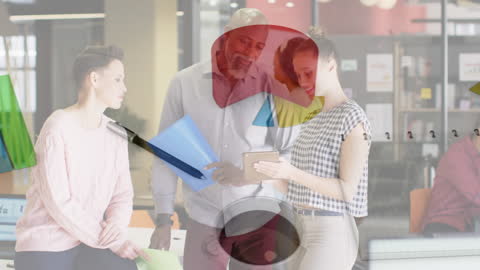 Diverse Office Team Collaborating with Tablet