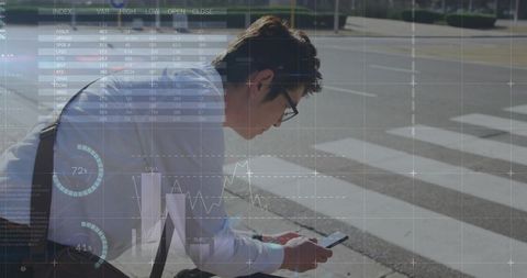 Leaning businessman checking smartphone at curb with financial data overlays