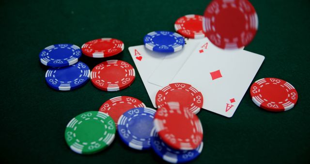 Poker Chips and Playing Cards on Casino Table - Download Free Stock Photos Pikwizard.com