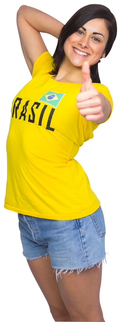 Confident Female Brazil Fan in Yellow T-Shirt Shows Thumbs Up - Download Free Stock Videos Pikwizard.com