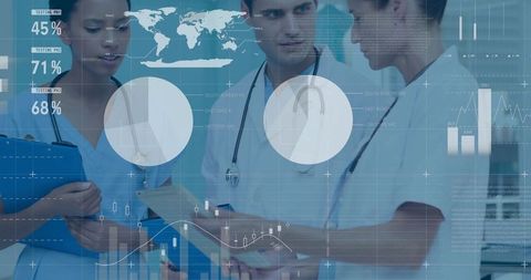 Healthcare team analyzing data with digital interface in hospital environment