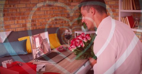 Man Arranging Red Roses for Romantic Virtual Celebration