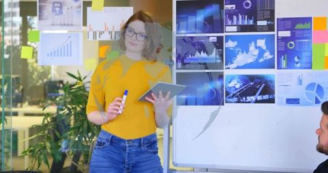 Businesswoman Collaborating in Contemporary Office Setting