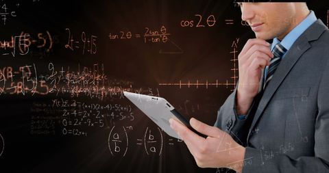 Businessman Analyzing Complex Data on Digital Tablet