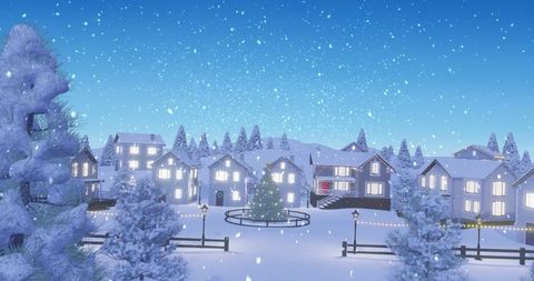 Charming winter village with snowy houses at sunset