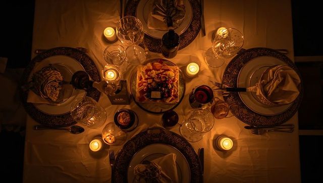 Candlelit Formal Dinner Table for Four with Ornate Chargers, Glassware, Romantic Ambience