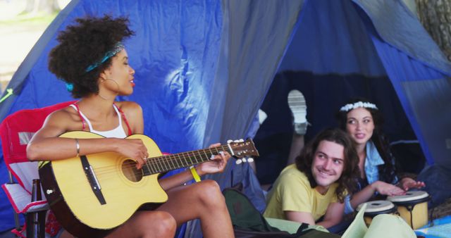 Group of Friends Camping and Playing Music Outdoors - Download Free Stock Images Pikwizard.com