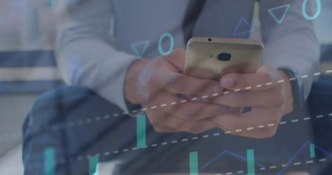 Analyzing Financial Data on Smartphone in Office Setting - Download Free Stock Images Pikwizard.com