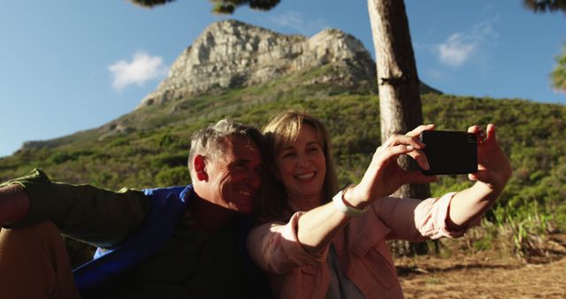 Elderly couple taking selfie during mountain hike - Download Free Stock Images Pikwizard.com