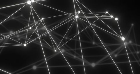 Glowing network connections with bright nodes on black background
