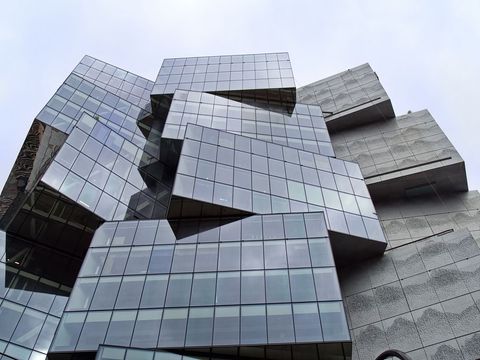 Modern cubic architecture with mirrored glass facade