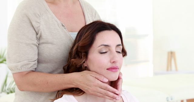 Professional Masseuse Giving Relaxing Neck Massage to Calm Client - Download Free Stock Images Pikwizard.com