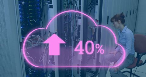 Female engineer analyzing server room data increase cloud computing