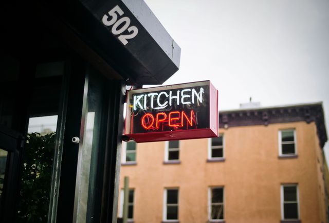 Kitchen Open Neon Sign on Urban Building Alleyway - Download Free Stock Photos Pikwizard.com