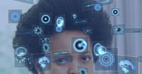 Woman Using Futuristic Holographic Interface for Data Visualization