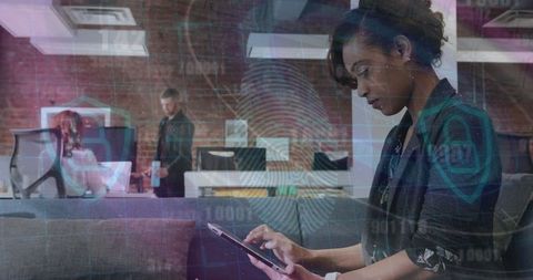 Professional Woman in Modern Office With Tablet