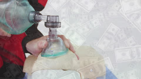 Paramedic Simulating Resuscitation with Financial Overlay