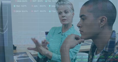 Business Professionals Analyzing Stock Market Graphs Together