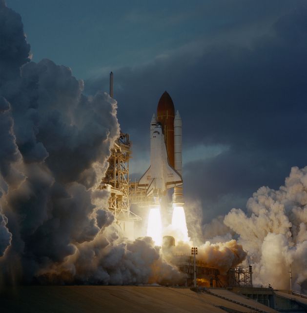 STS074-S-016 (12 Nov 1995) --- With five astronauts aboard, the Space Shuttle Atlantis lifts off from the Kennedy Space Center?s (KSC) Launch Pad 39A.  Launch occurred at 7:30:43:071 a.m. (EST), November 12, 1995.  The crew members were astronauts Kenneth D. Cameron, mission commander; James D. Halsell Jr., pilot; William S. McArthur Jr., Jerry L. Ross and Canadian astronaut Chris A. Hadfield, all mission specialists.  On November 15, 1995, the Space Shuttle Atlantis docked with Russia?s Mir Space Station, on which the NASA astronauts joined the Mir-20 crew.  The Mir-20 crew is composed of cosmonauts Yuriy P. Gidzenko, commander; and Sergei V. Avdeyev, engineer; along with the European Space Agency?s (ESA) Thomas Reiter, cosmonaut researcher.  Joint activities on the Mir Space Station and the Space Shuttle Atlantis ended on November 18, 1995, when the two spacecraft separated.  The November 20, 1995, landing also took place at KSC.
