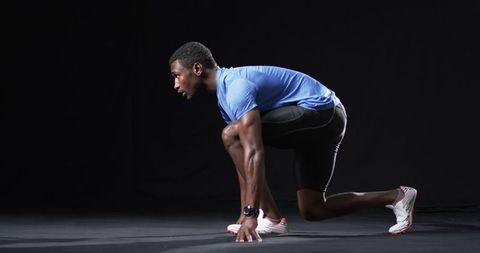 Athlete Ready to Sprint on Track with Determination