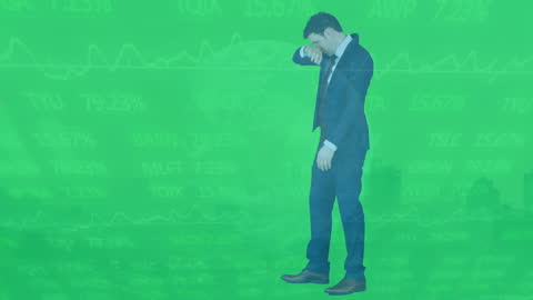 Depressed Businessman Amidst Stock Market Decline Visualization